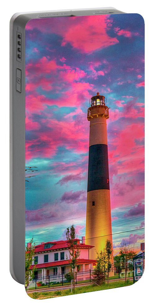 Atlantic City Portable Battery Charger featuring the photograph Absecon Lighthouse Fiery Sunrise by David Zanzinger
