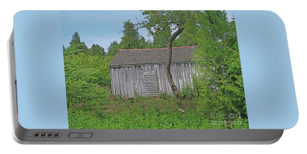 Barn Portable Battery Charger featuring the photograph Almost Overgrown by Ann Horn