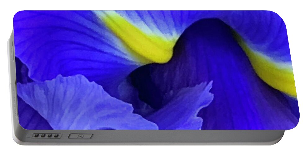 Iris Portable Battery Charger featuring the photograph An Iris Never Blinks by Tiesa Wesen