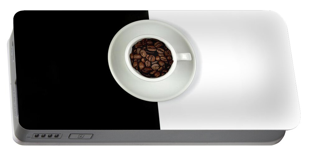 Still-life Portable Battery Charger featuring the photograph Aromatic Coffee beans on the pot by Michalakis Ppalis