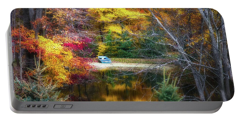 Colors Portable Battery Charger featuring the photograph Autumn Pond with Rowboat by Tom Mc Nemar