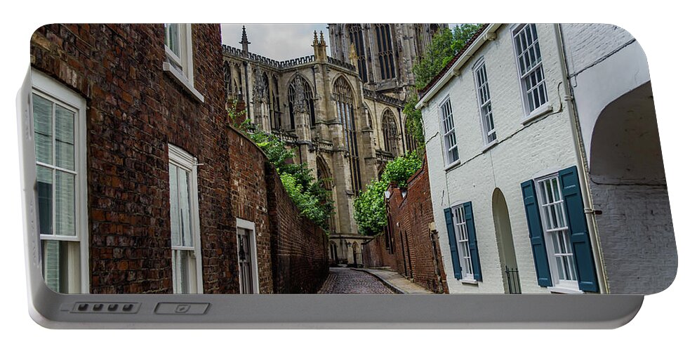 Ancient Portable Battery Charger featuring the photograph Back alley to York Minster by Scott Lyons