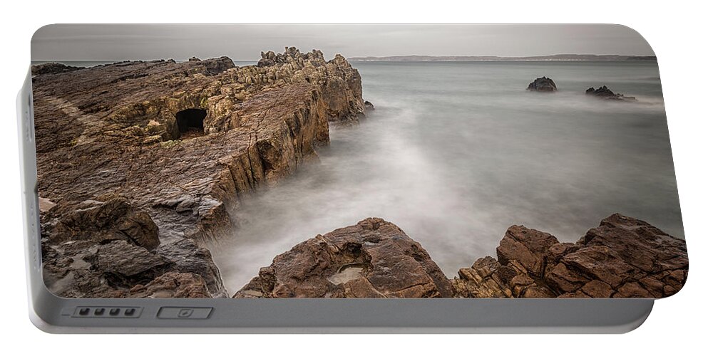 Pans Portable Battery Charger featuring the photograph Ballycastle - Pans Rock by Nigel R Bell