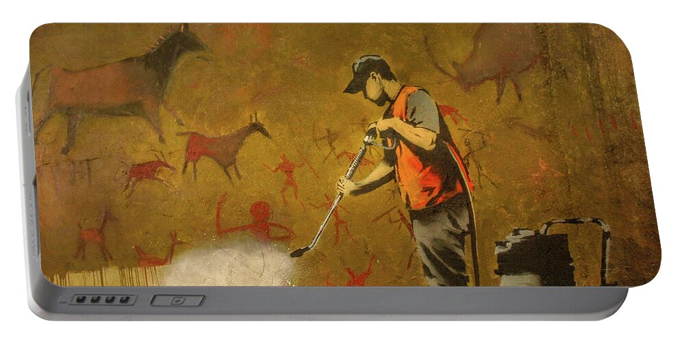 Banksy Portable Battery Charger featuring the photograph Banksy's Cave Painting Cleaner by Gigi Ebert
