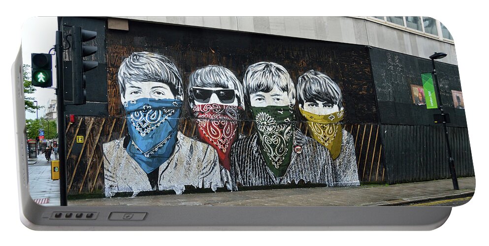 Bansky Portable Battery Charger featuring the photograph Yhe Beatles wearing face masks street mural in London by RicardMN Photography