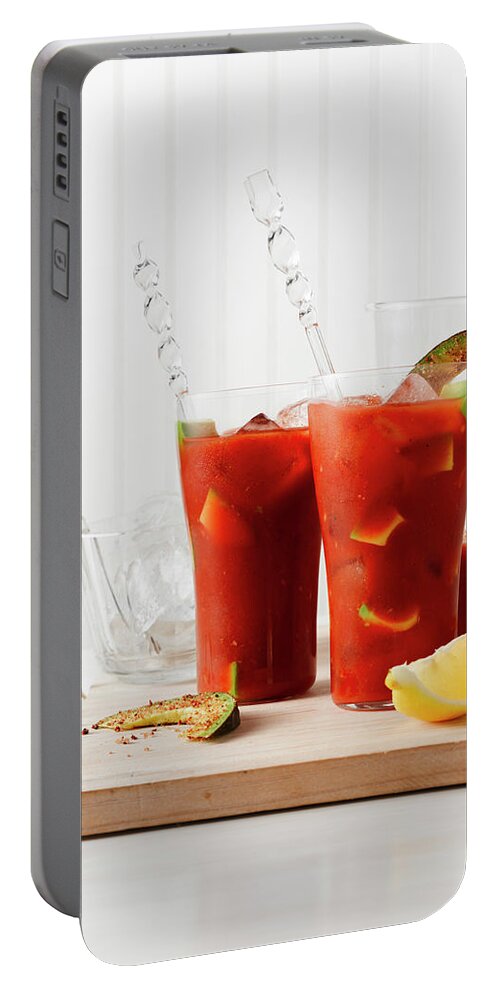 Ip_12480393 Portable Battery Charger featuring the photograph Bloody Mary With Avocado by Mark Loader