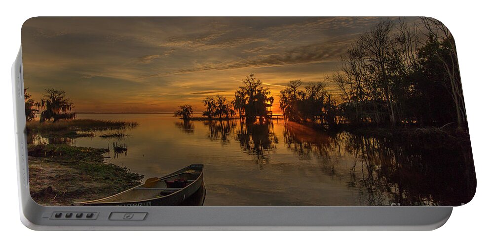 Canoe Portable Battery Charger featuring the photograph Blue Cypress Canoe by Tom Claud