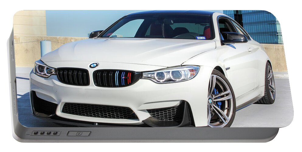 Bmw M4 Portable Battery Charger featuring the photograph Bmw M4 by Rocco Silvestri