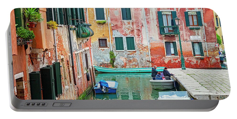 Venice Portable Battery Charger featuring the photograph Boats on a Venetian Canal by Lowell Monke