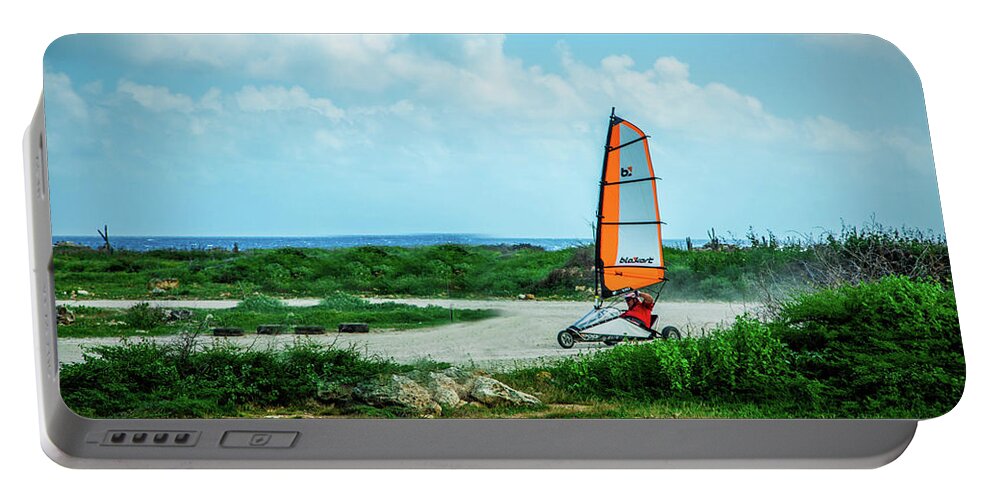 Landsailing Portable Battery Charger featuring the photograph Bonaire Land Sailor by Pheasant Run Gallery