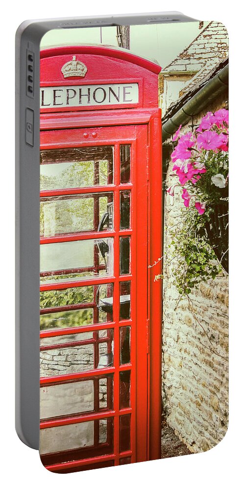 British Red Telephone Box Portable Battery Charger featuring the photograph Booth Among The Flowers by Joseph S Giacalone