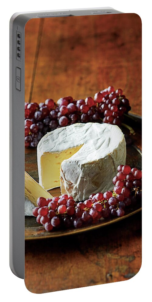 Food Portable Battery Charger featuring the photograph Brie with champagne grape by Cuisine at Home