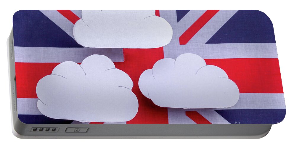 Flag Portable Battery Charger featuring the photograph British flag with three white clouds floating above by Simon Bratt
