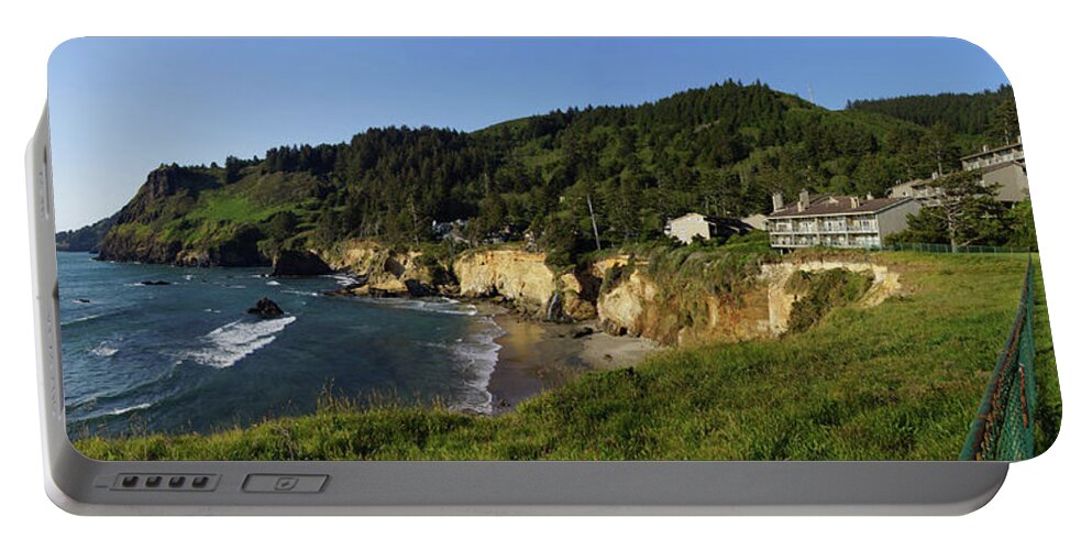 Cape Portable Battery Charger featuring the photograph Cape Foulweather with condominium by Steve Estvanik