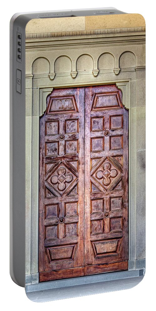 Medieval Portable Battery Charger featuring the photograph Carved Door of Cortona by David Letts