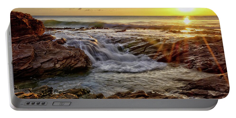 Cascading Portable Battery Charger featuring the photograph Cascading Sunset at Crystal Cove by Eddie Yerkish