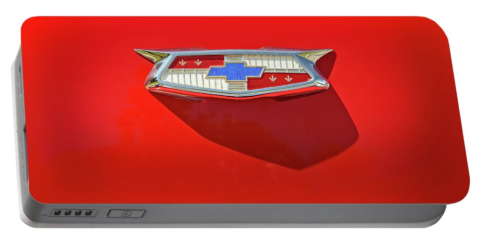 Vehicle Portable Battery Charger featuring the photograph Chevrolet Emblem on a 55 Chevy Trunk by Scott Norris