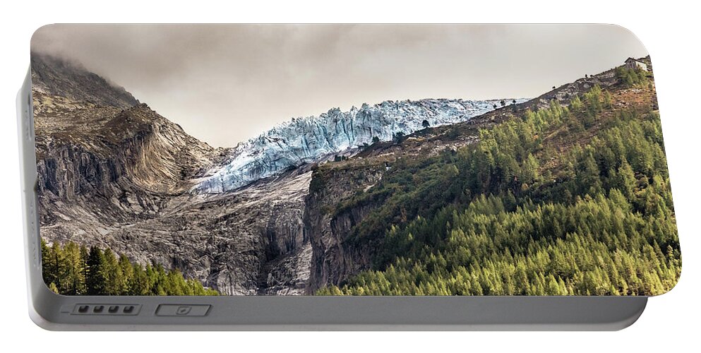 Glacier Portable Battery Charger featuring the photograph Cold Heart of the Mountain by Pavel Melnikov