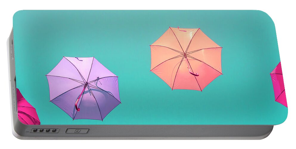 Color Portable Battery Charger featuring the photograph Colorful umbrellas by Patricia Hofmeester