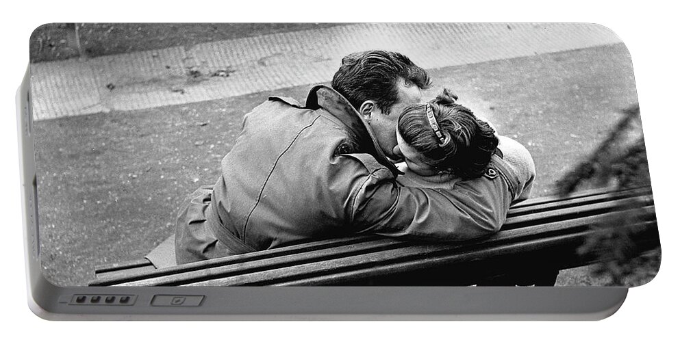 Couple Of Lovers Kissing On A Bench At The Pere Lachaise Portable Battery Charger featuring the photograph Couple of lovers kissing on a bench at the Pere Lachaise, Paris, 1955 by Gerald Bloncourt