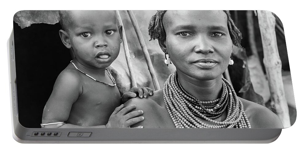 Portraits Portable Battery Charger featuring the photograph Dassanech Mother and Baby 2 by Mache Del Campo