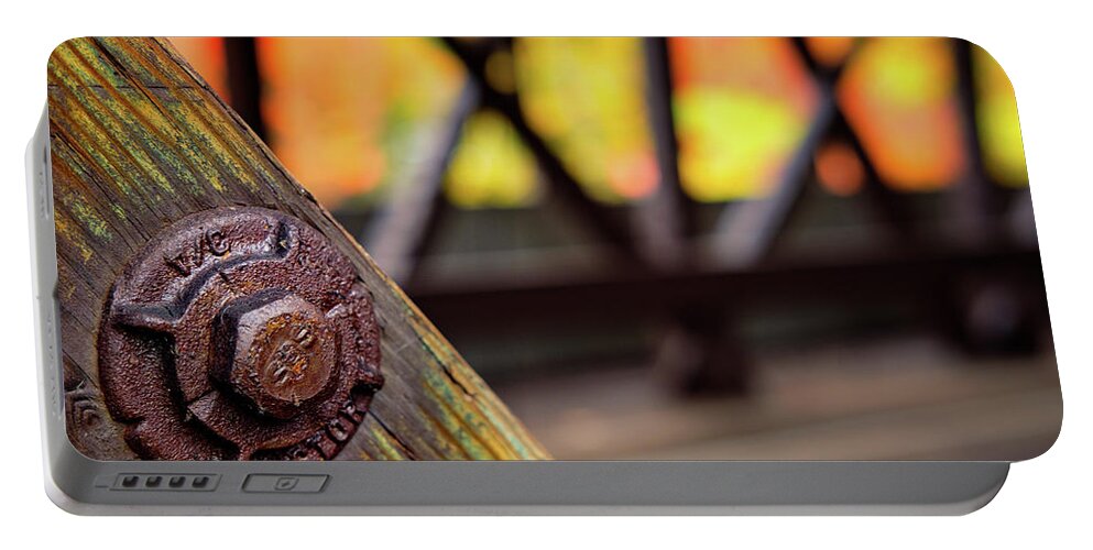 Autumn Portable Battery Charger featuring the photograph Details On A Covered Bridge by Jeff Sinon
