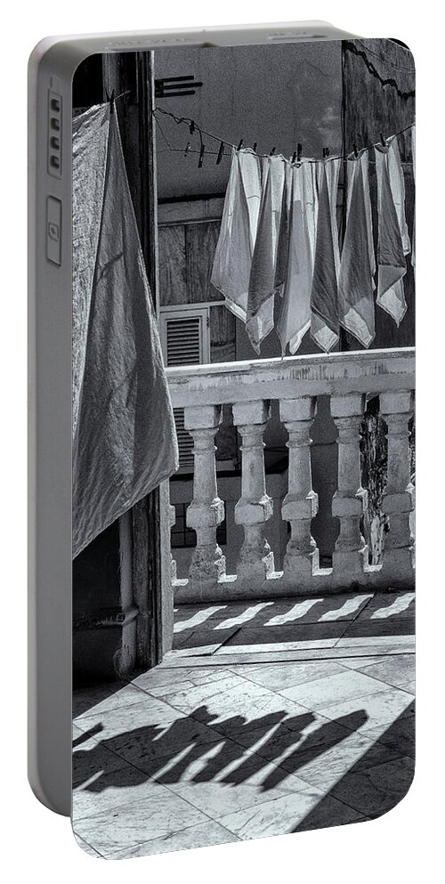 Havana Cuba Portable Battery Charger featuring the photograph Drying Napkins Black And White by Tom Singleton
