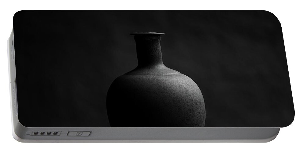 Clay Portable Battery Charger featuring the photograph Earthen pot in black and white by Alessandra RC