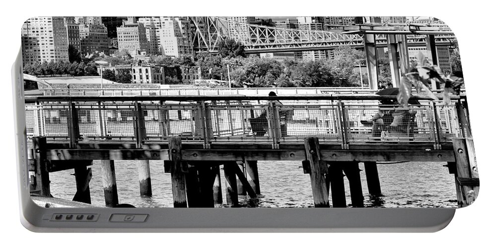 Cityscape Portable Battery Charger featuring the photograph East RiverScape No.1 by Steve Ember