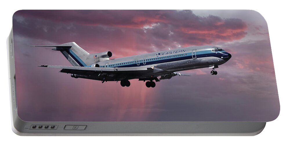 Eastern Airlines Portable Battery Charger featuring the photograph Eastern Boeing 727-225 Landing in a Winter Storm Sunset by Erik Simonsen