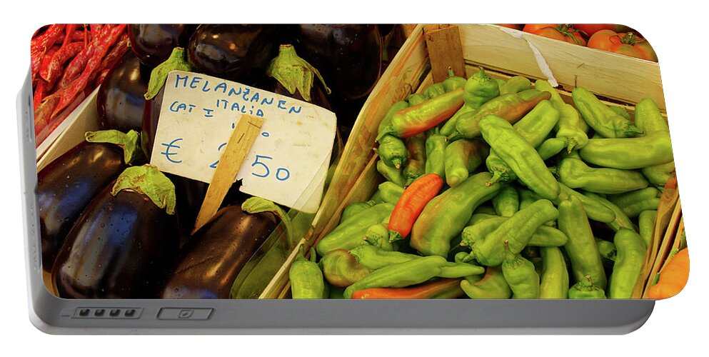 Bolzano Portable Battery Charger featuring the photograph Eggplant and peppers at an outdoor market by Steve Estvanik