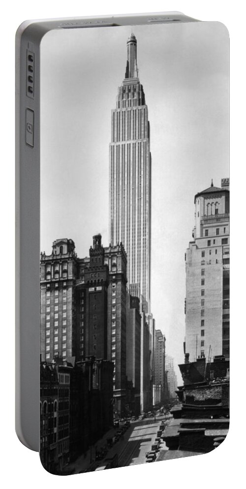 Empire State Building Portable Battery Charger featuring the photograph Empire State Building - 1931 by War Is Hell Store