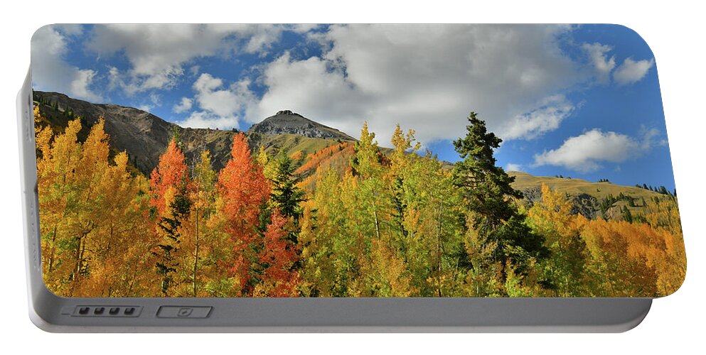 Colorado Portable Battery Charger featuring the photograph Fall Colored Aspens Bask in Sun at Red Mountain Pass by Ray Mathis