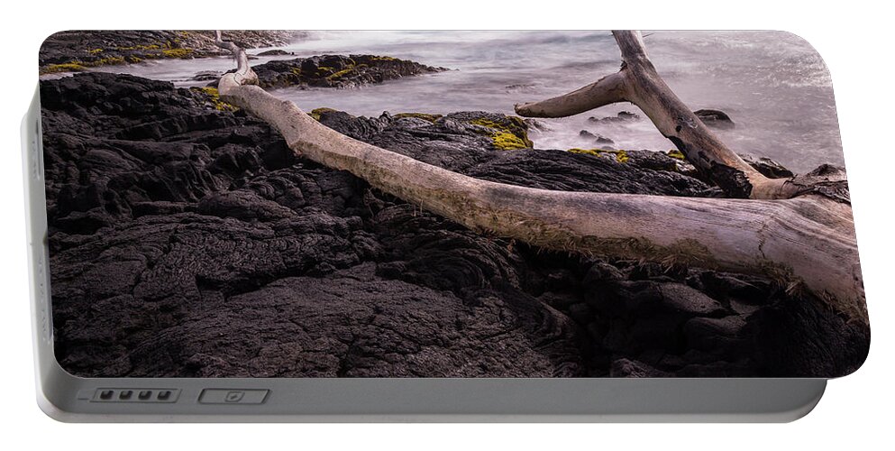 Punalu'u Portable Battery Charger featuring the photograph Fallen Tree at Punalu'u Beach by John Daly