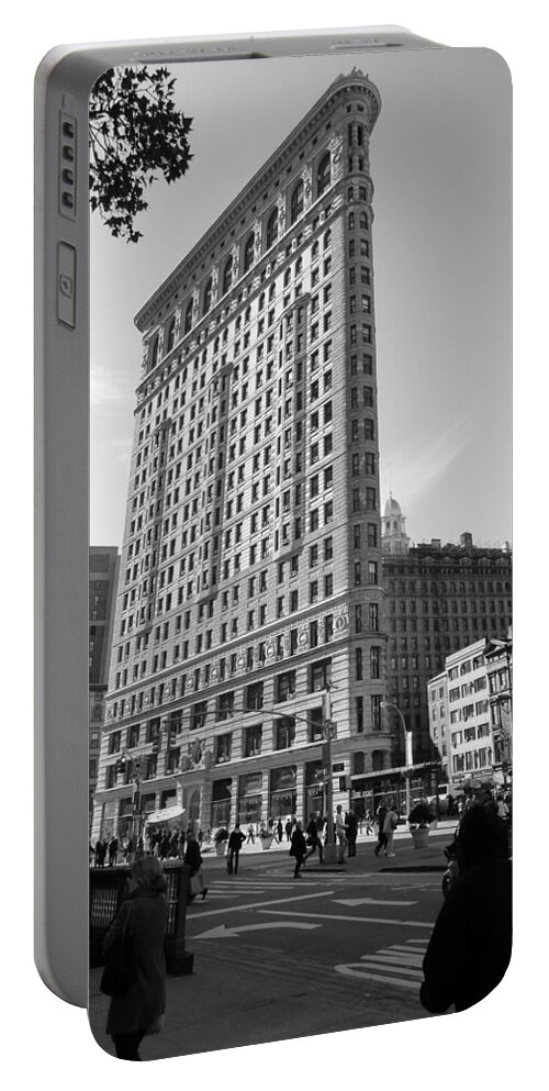 Flatiron Portable Battery Charger featuring the photograph Flatiron Building NYC from a busy sidewalk by Patricia Caron