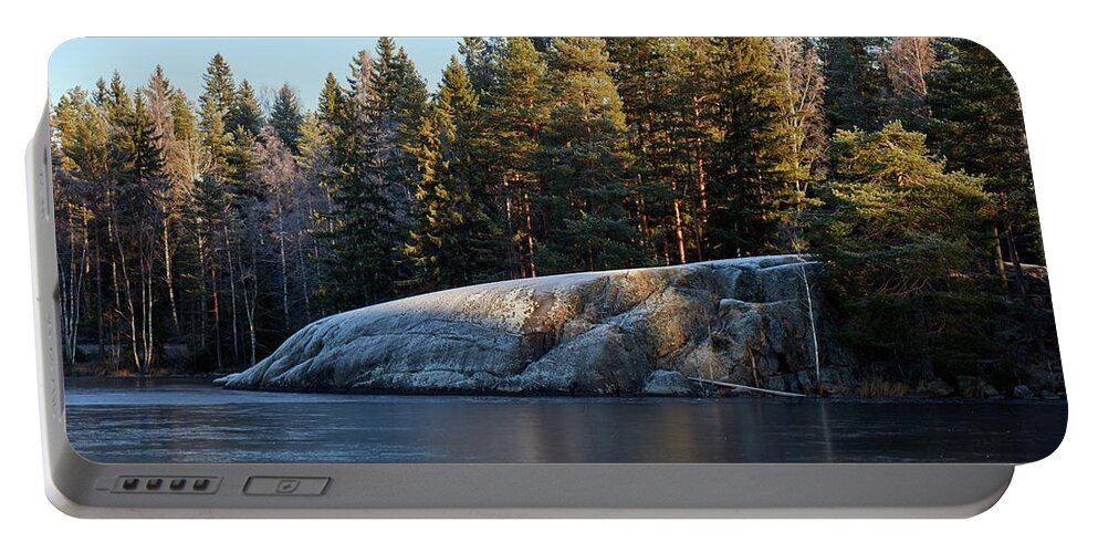 Finland Portable Battery Charger featuring the photograph Frozen lake in the morning light by Jouko Lehto