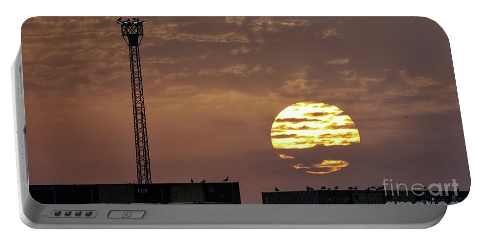 Bright Portable Battery Charger featuring the photograph Giant Sun at Sunrise Cadiz Harbour by Pablo Avanzini