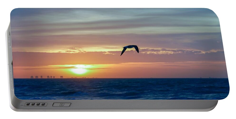 Sunset Portable Battery Charger featuring the photograph Going Solo by Susan Rydberg