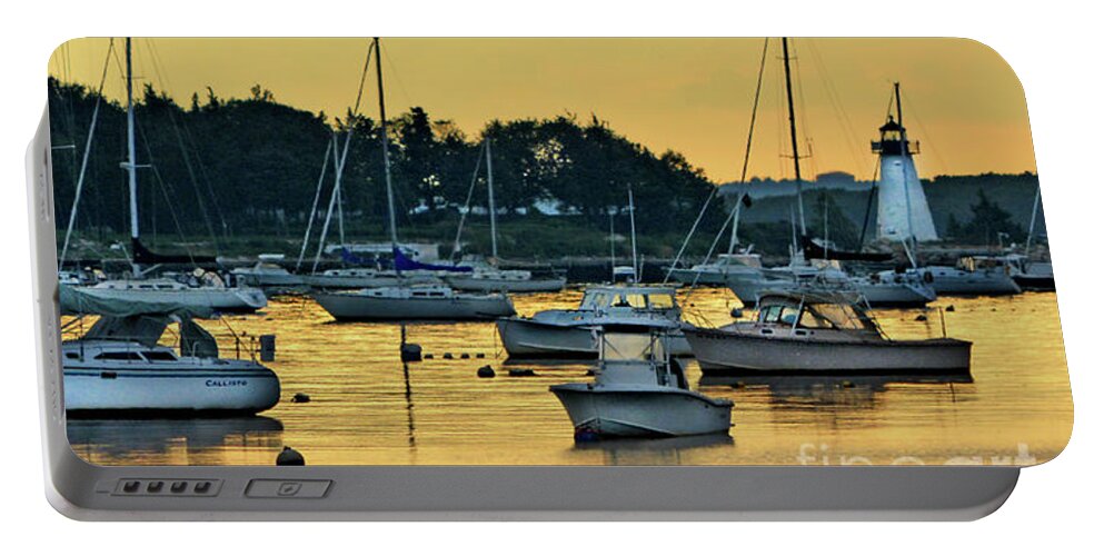 Boats Portable Battery Charger featuring the photograph Golden harbor by Dianne Morgado