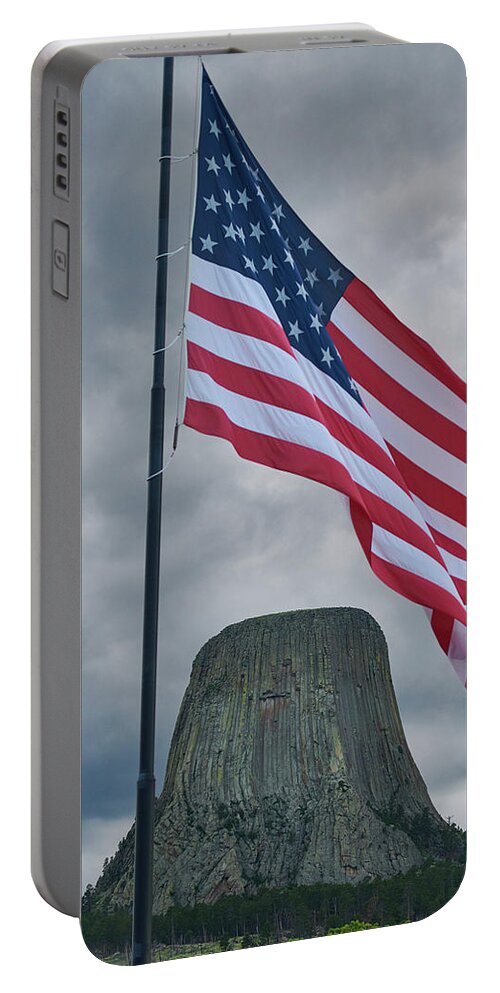 Rock Portable Battery Charger featuring the photograph Half Mast Flag Over Devils Tower by Paul Freidlund