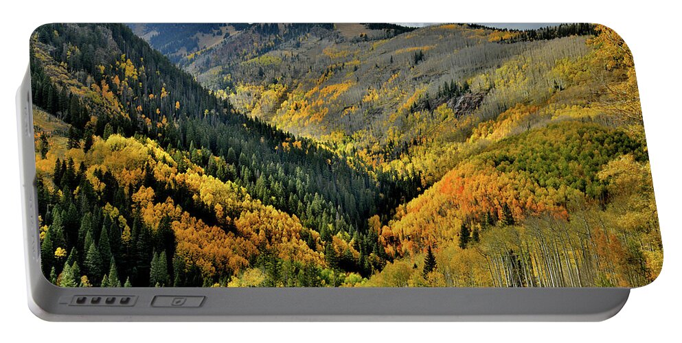 Highway 145 Portable Battery Charger featuring the photograph Highway 145 Fall Colors in the Spotlight by Ray Mathis