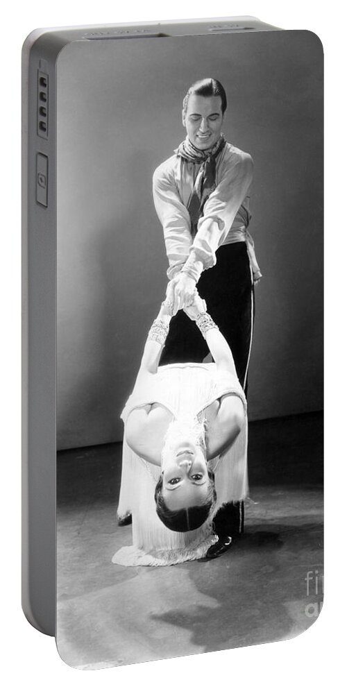 Musical Portable Battery Charger featuring the photograph In Caliente 1935 by Sad Hill - Bizarre Los Angeles Archive