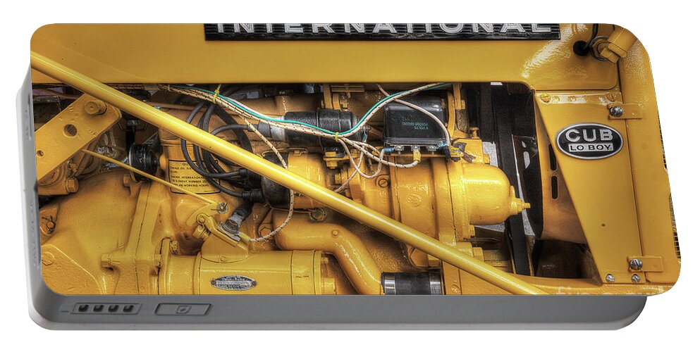 Tractor Portable Battery Charger featuring the photograph International Cub Engine by Mike Eingle