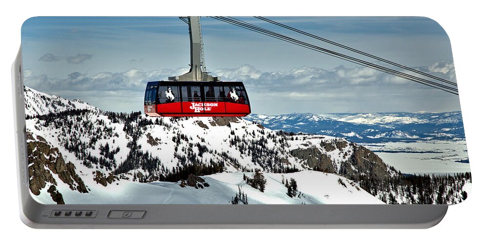 Jackson Hole Tram Portable Battery Charger featuring the photograph Jackson Hole Aerial Tram Over The Snow Caps by Adam Jewell