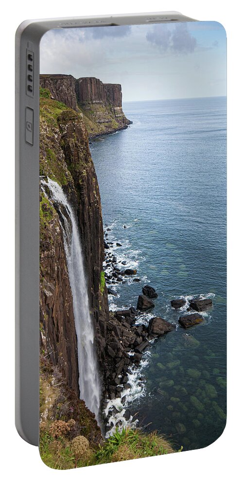 Waterfall Portable Battery Charger featuring the photograph Kilt rock with the Mealt falls at the Isle of Skye in the Highla by Michalakis Ppalis