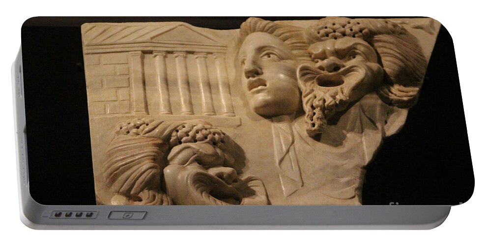 Comic Portable Battery Charger featuring the photograph Marble Relief of Character Theater Masks at Pompeii Exhibit by Colleen Cornelius