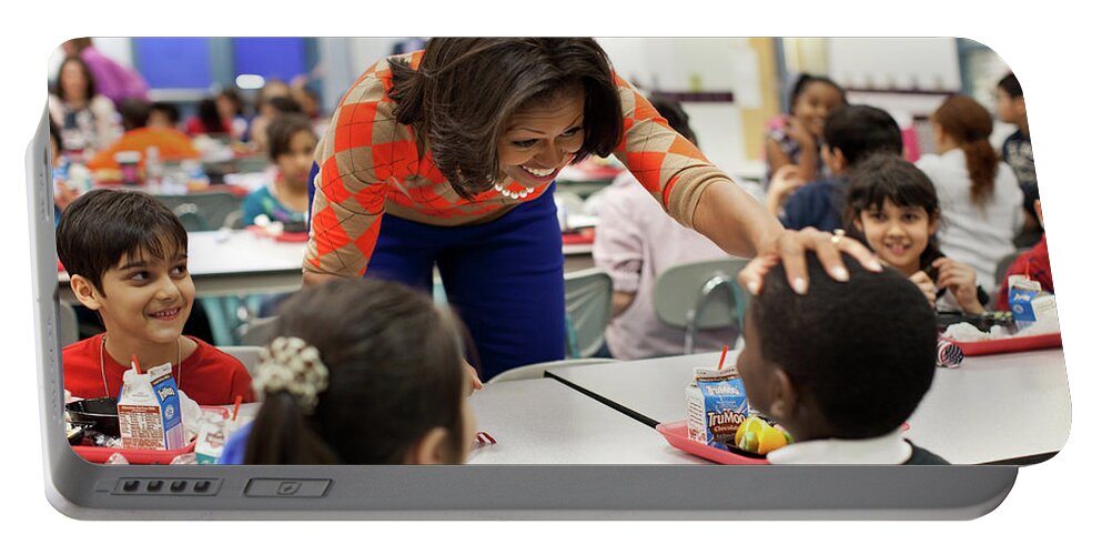 2012 Portable Battery Charger featuring the photograph Michelle Obama Has Lunch With Students by Science Source
