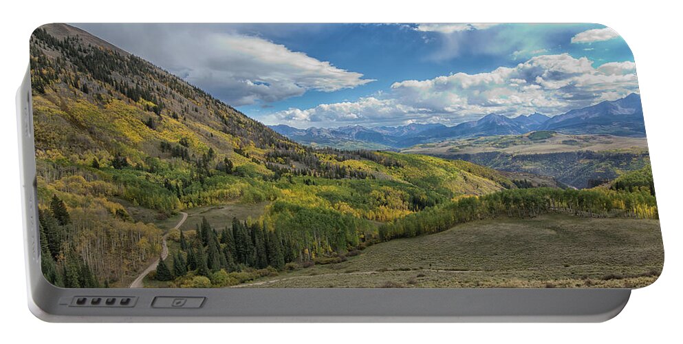 Colorado Portable Battery Charger featuring the photograph Miles To Go by Tom Kelly