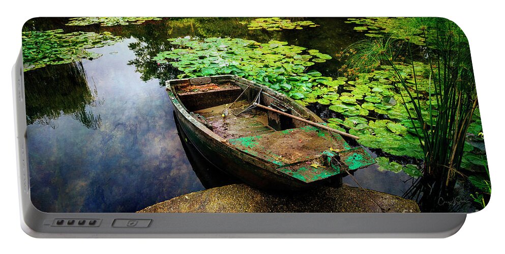 France Portable Battery Charger featuring the photograph Monet's Gardeners Boat by Craig J Satterlee
