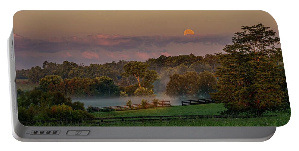 Moon Portable Battery Charger featuring the photograph Moonset at Sunrise by Ulrich Burkhalter
